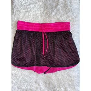 Academy Ltd. women's sz. XS pink/blk reversible mesh sport shorts. Comfortable
